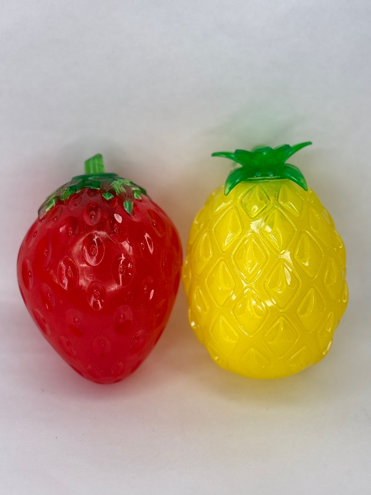 PELOTA FRUTA SILICONADA C/LUZ 10CM JUG006